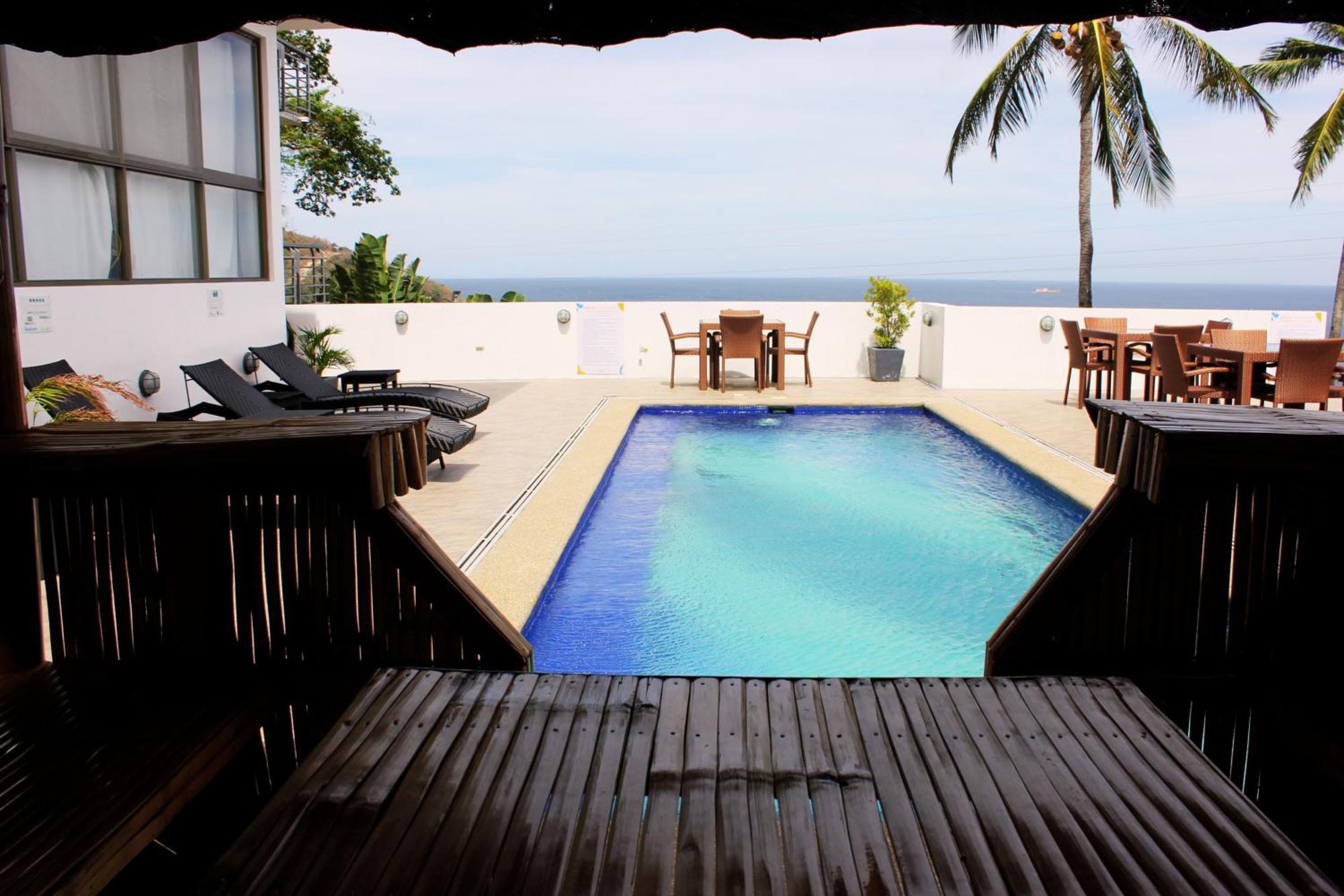 Av Suites Puerto Galera Buitenkant foto
